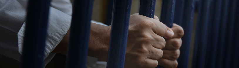 person behind bars